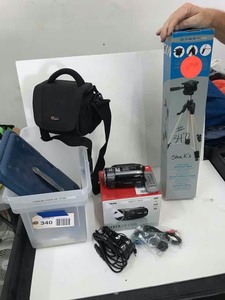 lot 340 image: Canon Vixia HFS100 HD Camcorder wDynex tripod