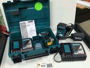 lot 452 image: Makita 18v Sander, Model XOB01 wcharger, Makita 18 v Cordless impact Driver Kit