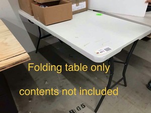 lot 471 image: Folding Table, 5 ft (folds in half) (contents not included)