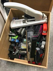 lot 551 image: Box of Staplers & Staple Pullers