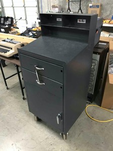 lot 573 image: Metal warehouse desk on wheels