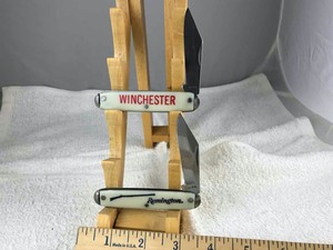 lot 768 image: (2) U.S.A. Folding Knives Winchester, Remington