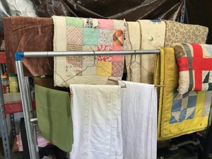 lot 36 image: WornOld Quilts, Table Cloths, Pieces of Fabric