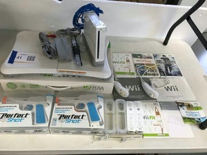lot 41 image: Nintendo Wii  Fit, Controller, (2) Gun Grips, Hand Controls
