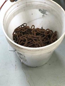 lot 72 image: Bucket of chains