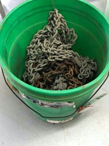 lot 73 image: Bucket of chains
