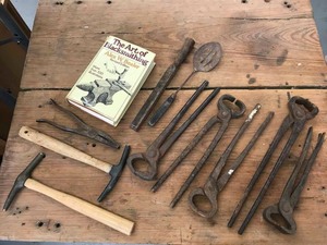 lot 86 image: Blacksmithfarrier tools and book