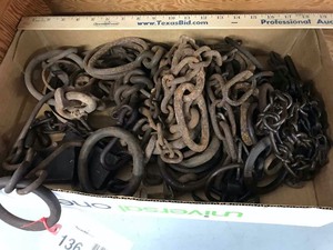 lot 136 image: Rings and pieces of chain