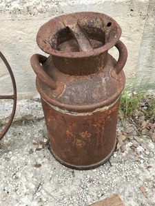 lot 308 image: Old Rusty Milk Can