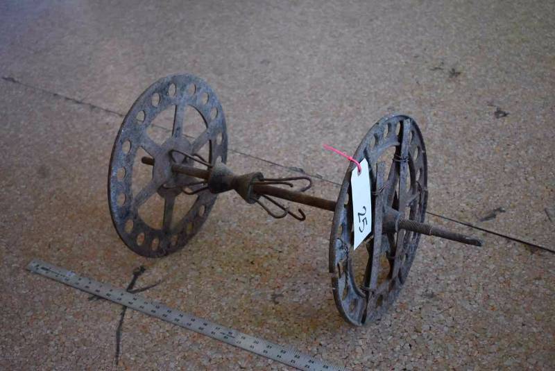lot 25 image: Architecturally Interesting Cast Iron SpoolReel (damaged, but old repair)