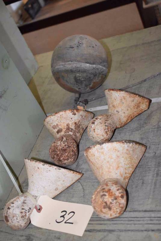 lot 32 image: (4) Cast Iron Ball & Claw Tub Feet & a copper float