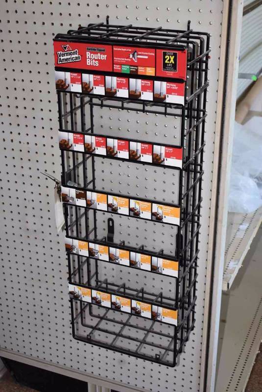 lot 45 image: Modern Locking Displayer Stand (also hangs on pegboard)