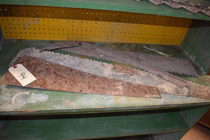 lot 94 image: (3) Old Rusty Saw Blades, (1)Sickle Blade