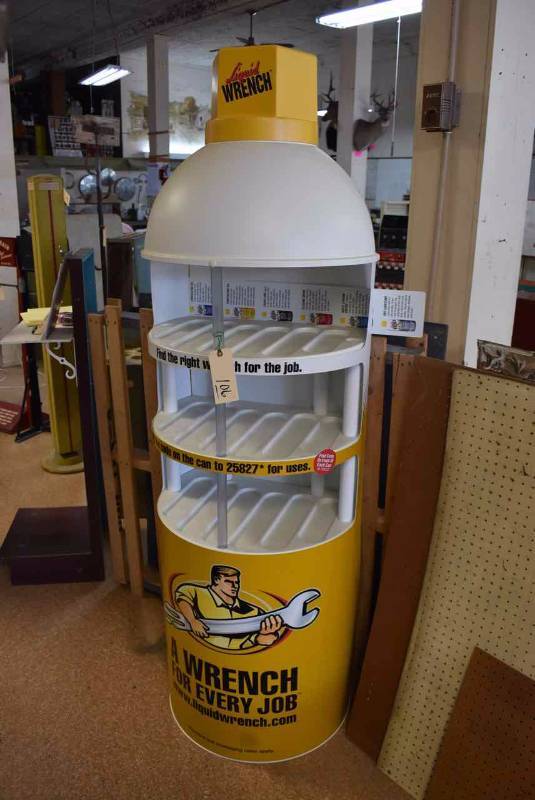 lot 106 image: Modern Display Stand Liquid Wrench