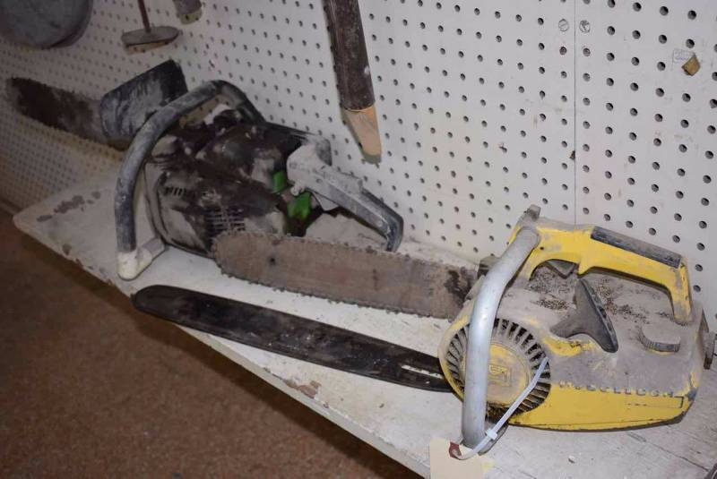 lot 161 image: (2)Old Chain Saws