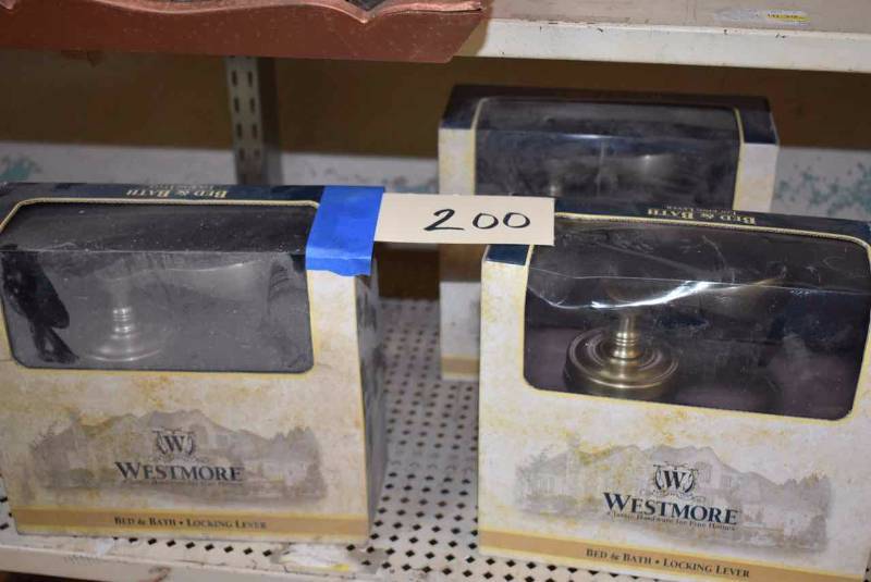 lot 200 image: (3) Satin Nickel Westmore Door Knobs 2 locking lever, 1 unlocking lever