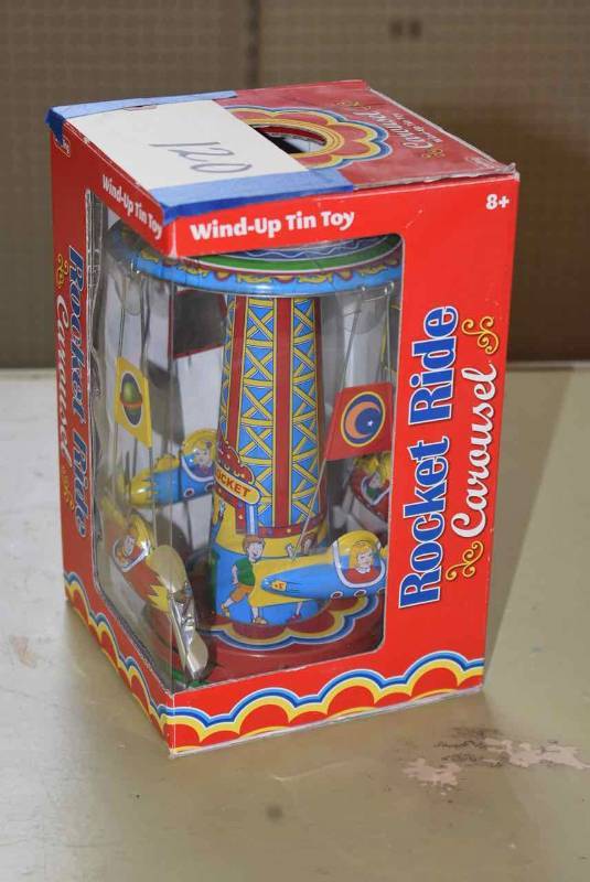 lot 120 image: Tin Toy  Rocket Ride ()