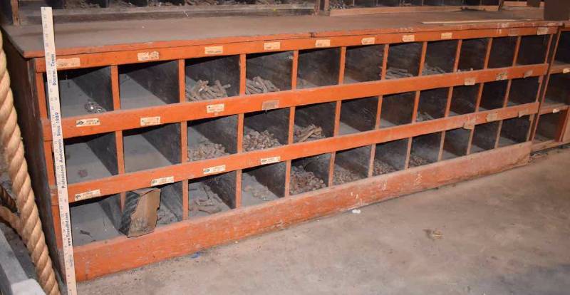 lot 240 image: Orange Antique Cubbied Hardware Cabinet & Contents