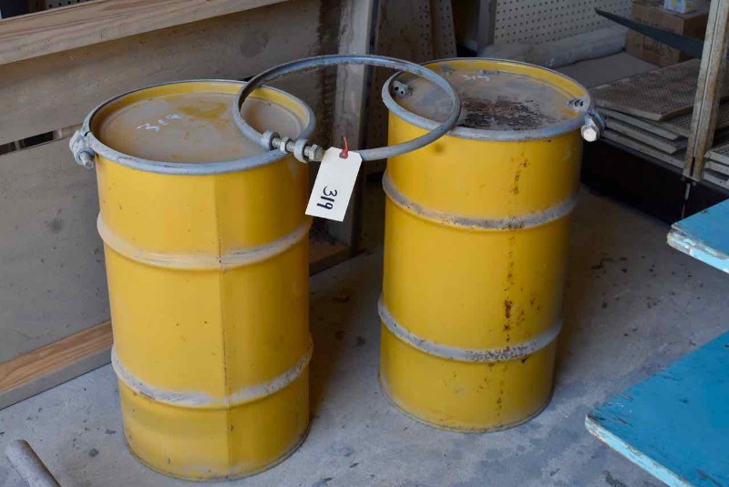 lot 319 image: (2) Yellow Metal Barrels