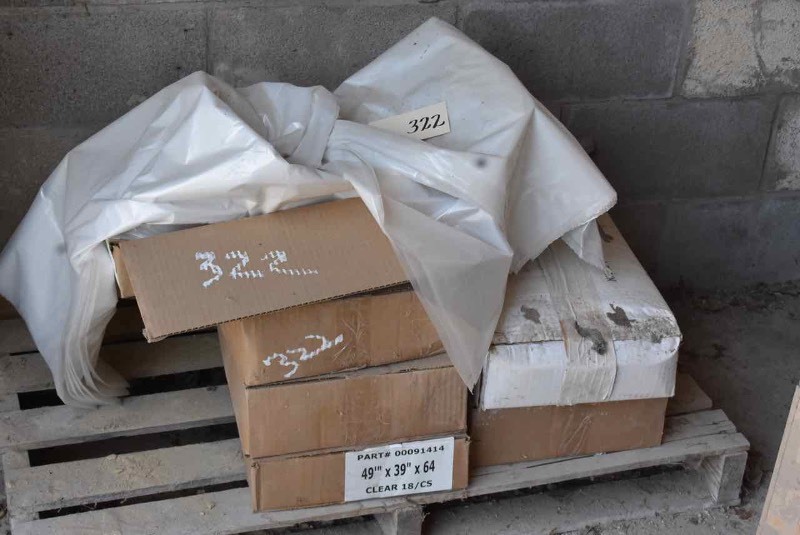 lot 322 image: Big Clear Plastic Bags to Cover Pallets of Concrete