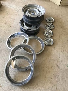 lot 295 image: (4) Corvette Rally Rings, Disc Brake Center Caps, (3) 15 x 7 Wheels