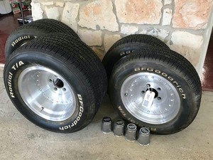 lot 257 image: (4) American Racing Aluminum Wheels with BFG Radial TA with Center Caps