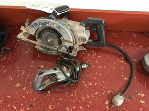 lot 261 image: Black & Decker Worm Drive Saw, Drill Motor