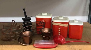 lot 92 image: Vintage Plastic Ware  Red Canister Set, Butter Dish Jennings Store Pipe Creek, Tx., Little Wall Planters