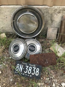 lot 132 image: Hubcaps, License Plates