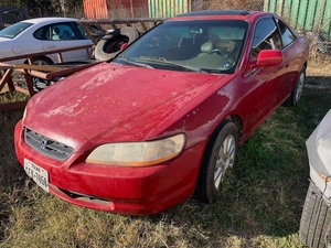 lot 3 image: Storage Lien Abandoned 1999 red Honda UEX (1HGCG2254XA024627)
