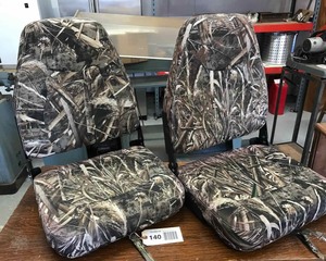 lot 140 image: (2) Real Tree Boat Seats (look to be newunused)