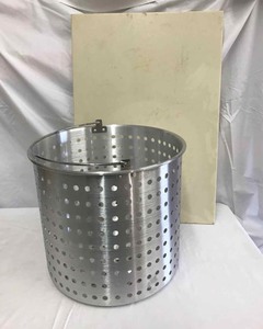 lot 334 image: Aluminum Crawfish Basket and a cutting board