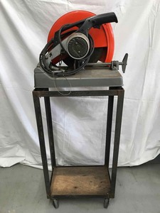 lot 6 image: Makita 14 inch Portable Cut-Off Saw (2414) and a Stand