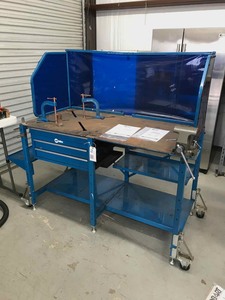 lot 73 image: Miller Arcstation with Welding Shield, Vise, Drawers, Side Tray, Casters, Clamps