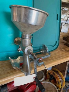 lot 53 image: Squeezo Strainer & a Peeler