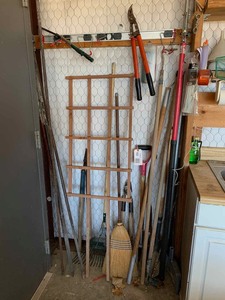 lot 63 image: Lawn & Garden Hand Tools pruners, rakes, long handled tree pruner saw