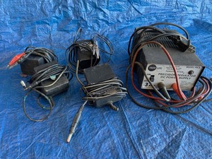 lot 74 image: (1) 12 volt power supply, several miscellaneous power supplies