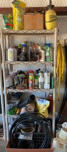 lot 94 image: Assorted LawnGarden Supplies  Chemicals, Hand Tools, Oil Lamp, Pot, Etc. And (1) Plastic Shelving Unit