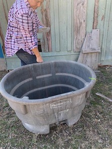 lot 113 image: Rubbermaid 70 gallon tub